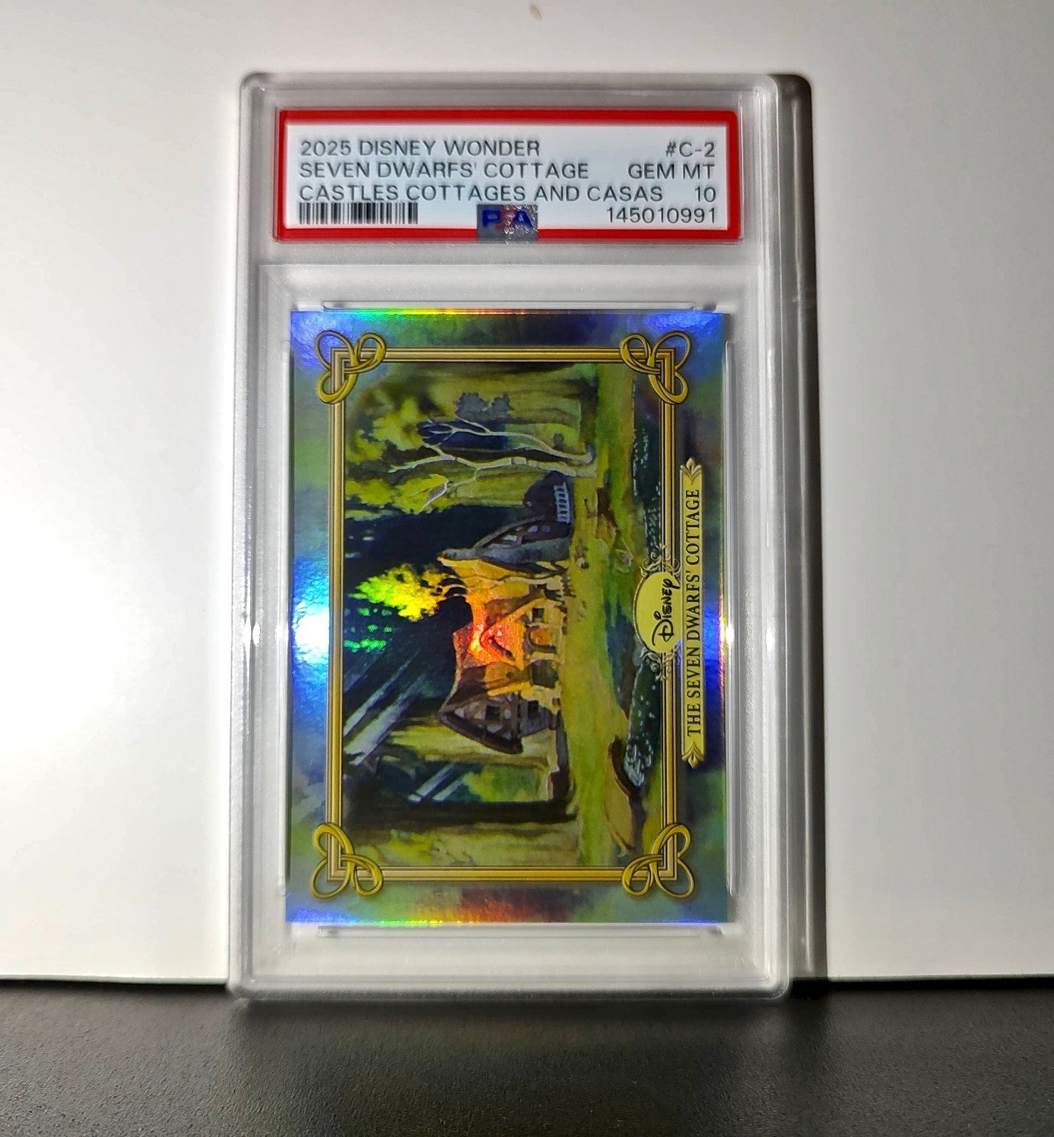 The Seven Dwarfs' Cottage 2025 Topps Disney #C-2 Card PSA 10
