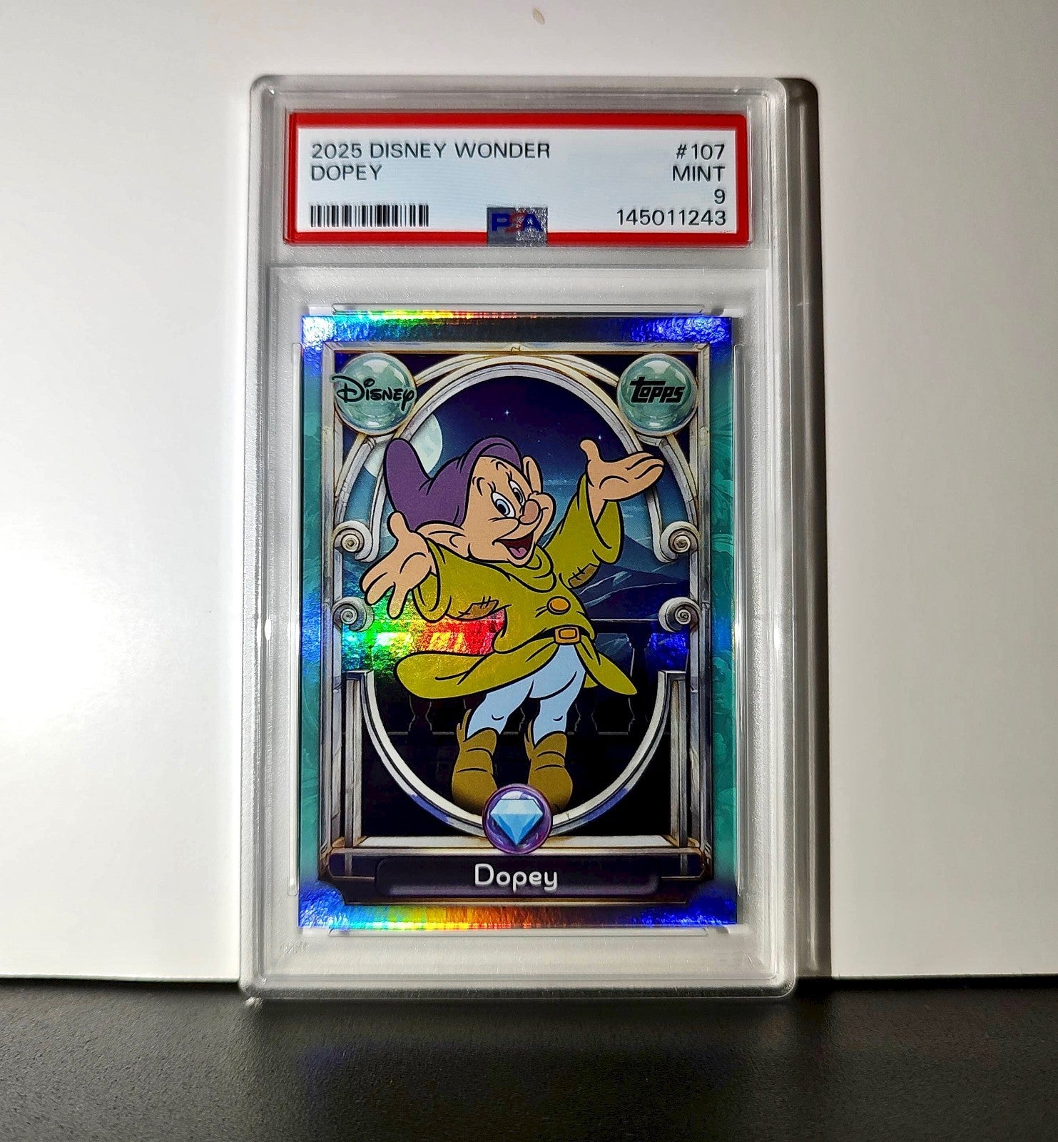 Dopey 2025 Topps Disney #107 Diamond Card Snow White and the Seven Dwarfs PSA 9