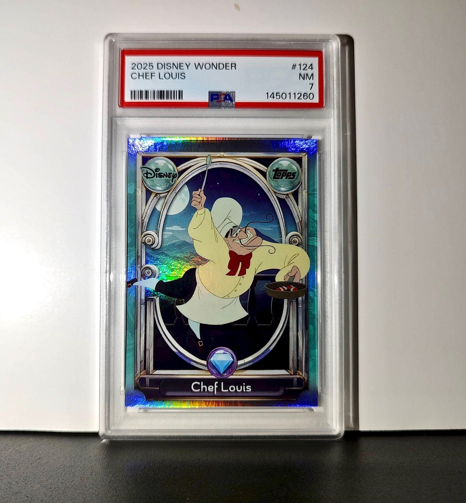 Chef Louis 2025 Topps Disney Wonder #124 Diamond Card The Little Mermaid PSA 7