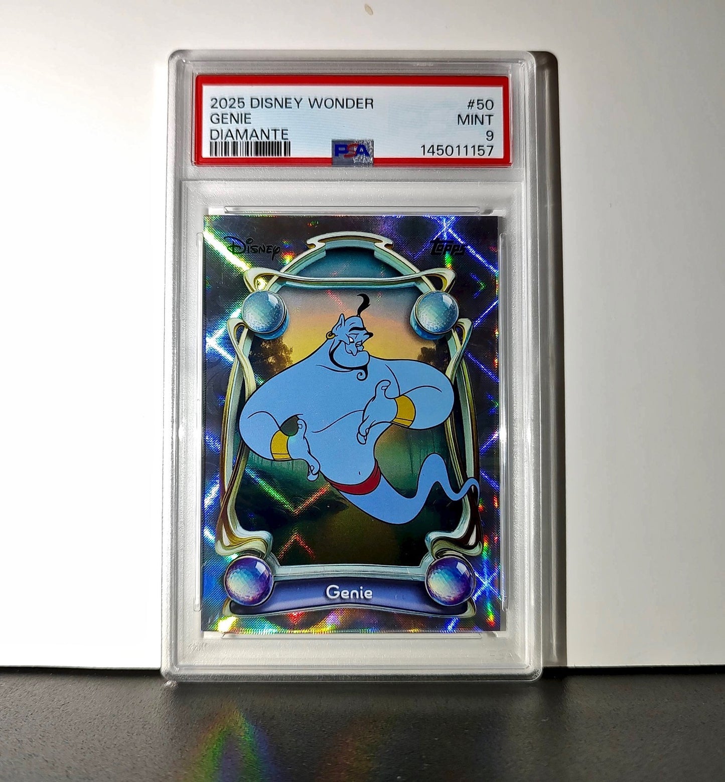 Genie 2025 Topps Disney Wonder #50 Winter Variant Card Aladdin PSA 9