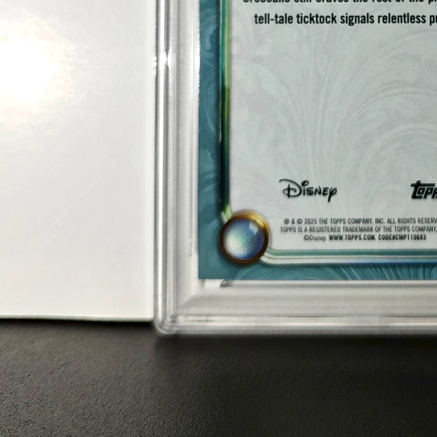 Tick-Tock 2025 Topps Disney Wonder #119 Diamond Card Peter Pan PSA 9