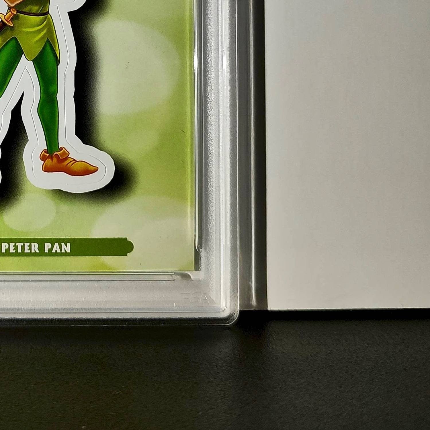 Peter Pan 2025 Topps Disney #ES-8 Enchanted Sticker Card Peter Pan PSA 9