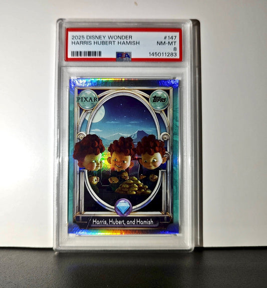 Harris, Hubert, and Hamish 2025 Topps Disney #147 Diamond Card Brave PSA 8