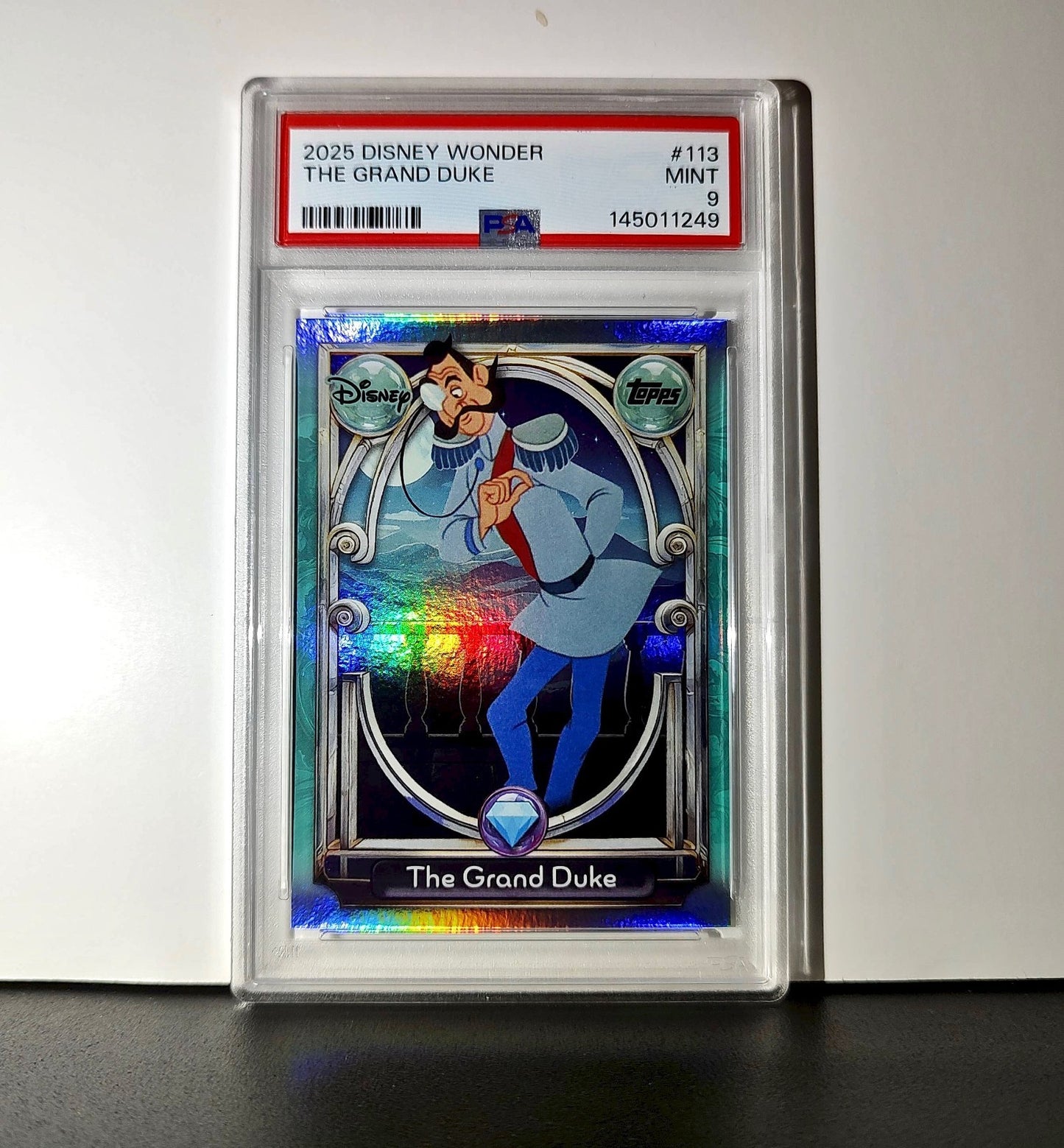 The Grand Duke 2025 Topps Disney Wonder #113 Diamond Card Cinderella PSA 9