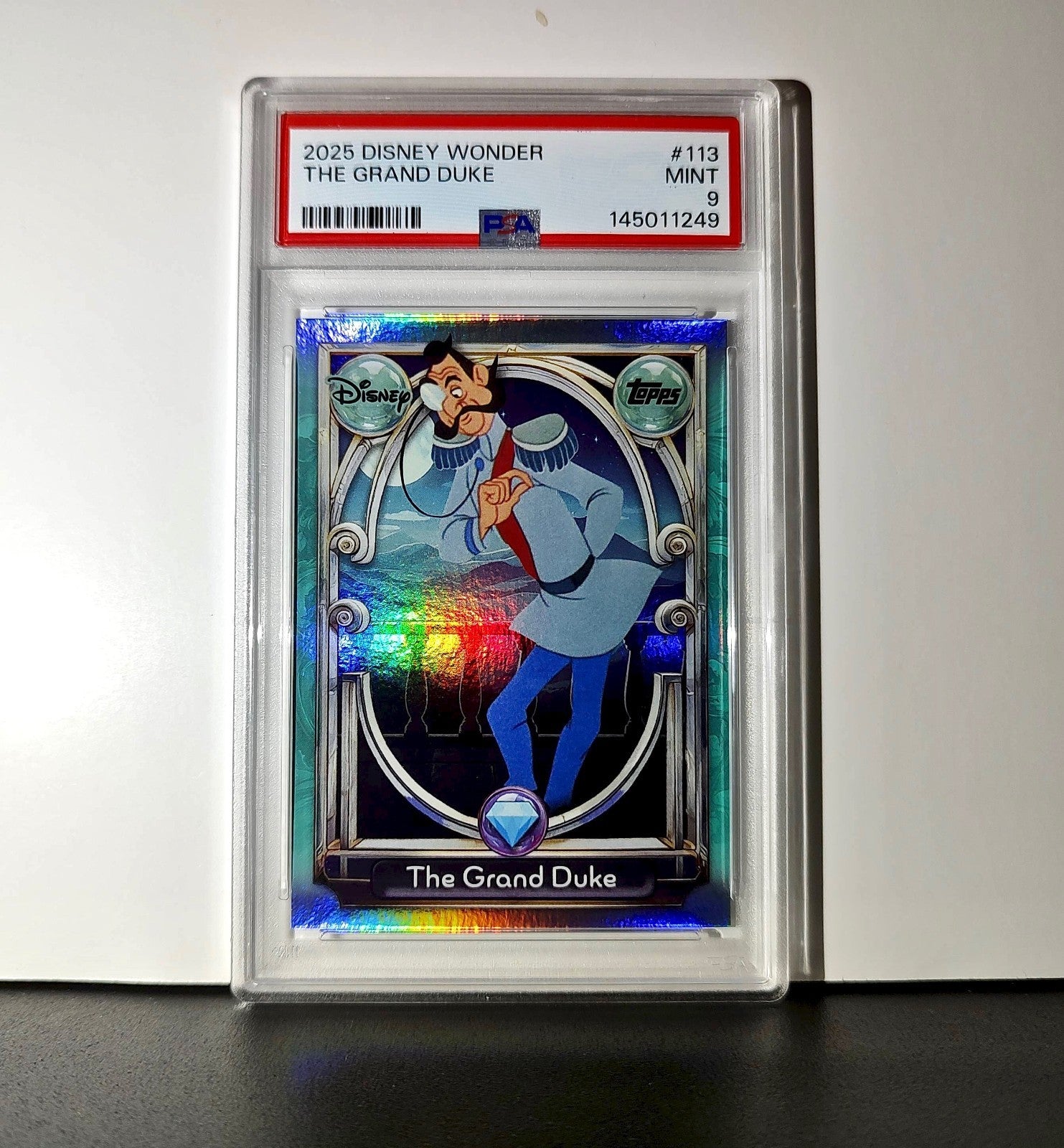 The Grand Duke 2025 Topps Disney Wonder #113 Diamond Card Cinderella PSA 9