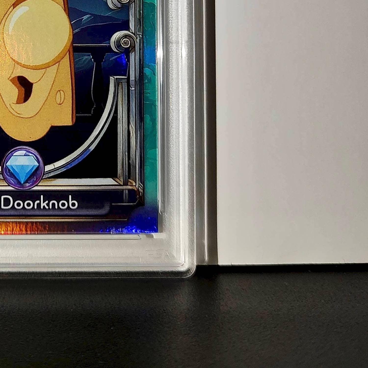 The Doorknob 2025 Topps Disney #117 Diamond Card Alice in Wonderland PSA 9