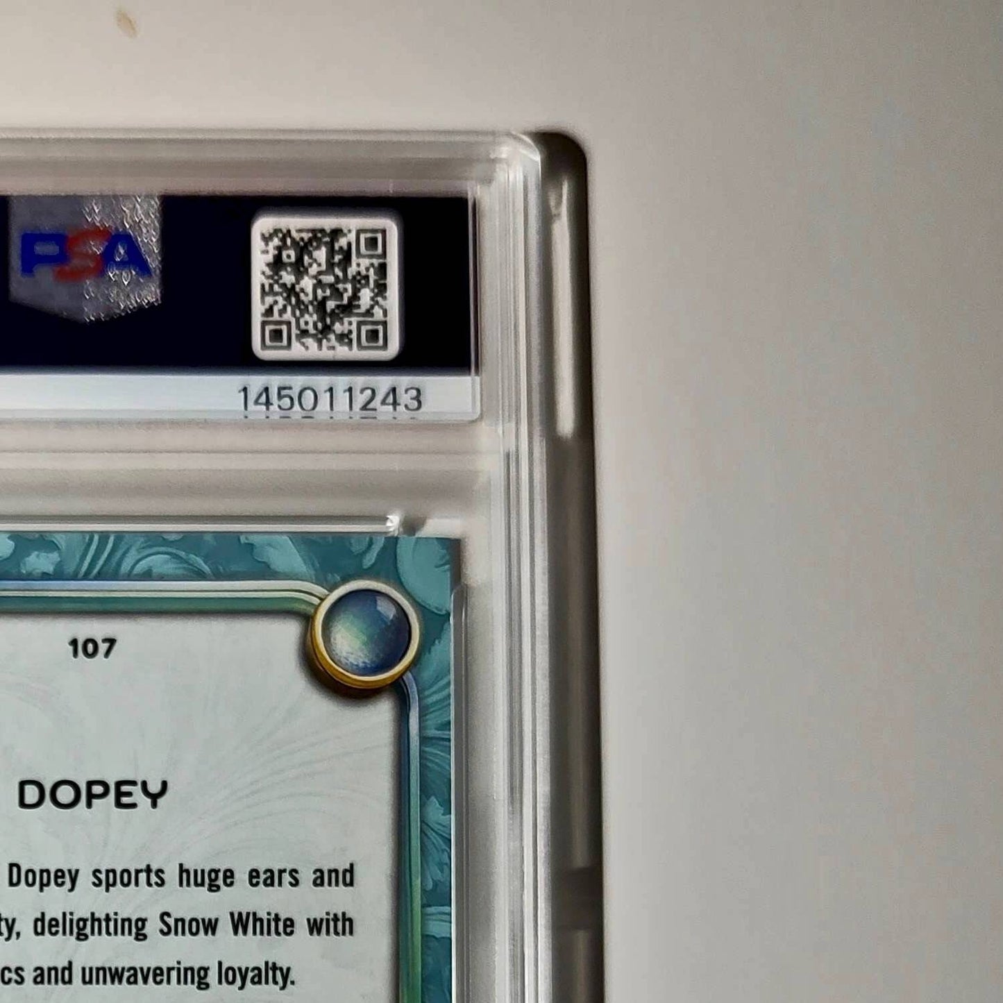 Dopey 2025 Topps Disney #107 Diamond Card Snow White and the Seven Dwarfs PSA 9