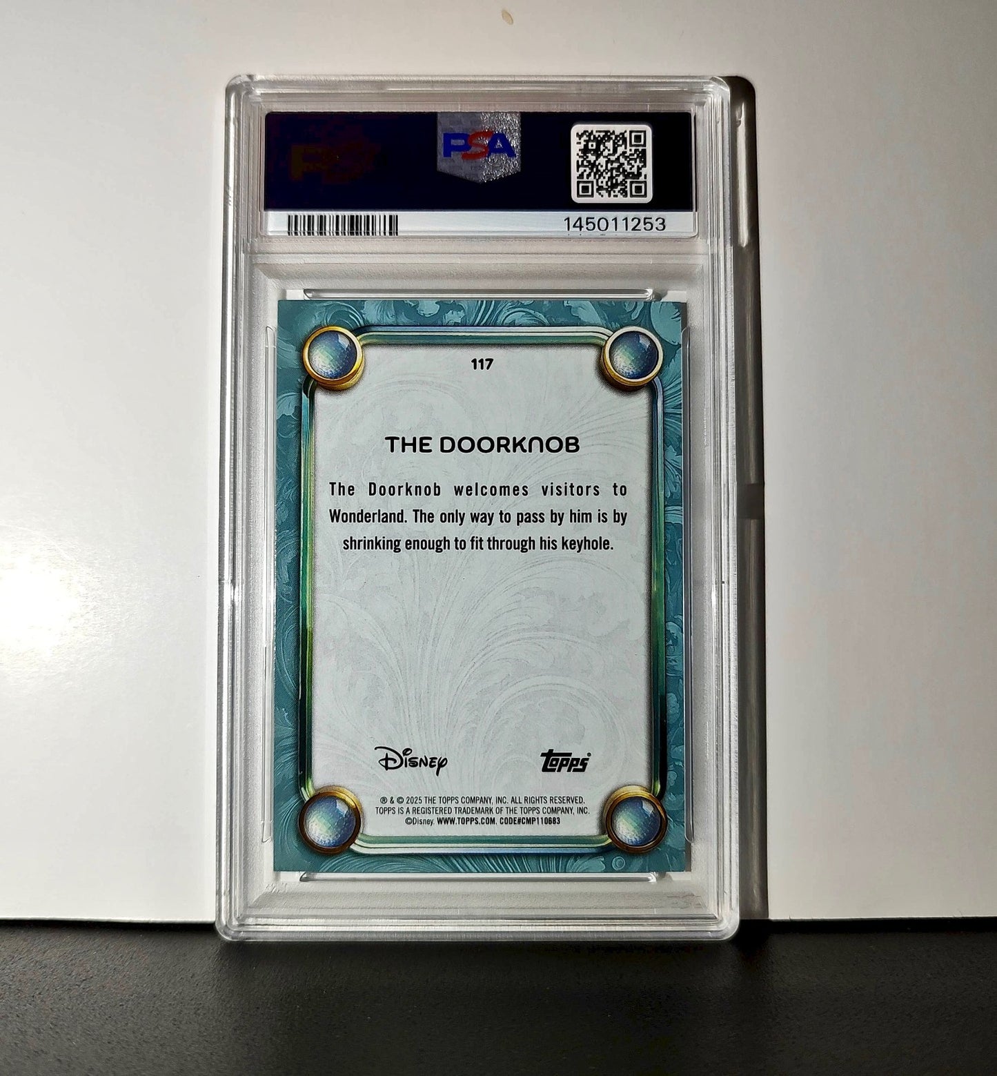 The Doorknob 2025 Topps Disney #117 Diamond Card Alice in Wonderland PSA 9