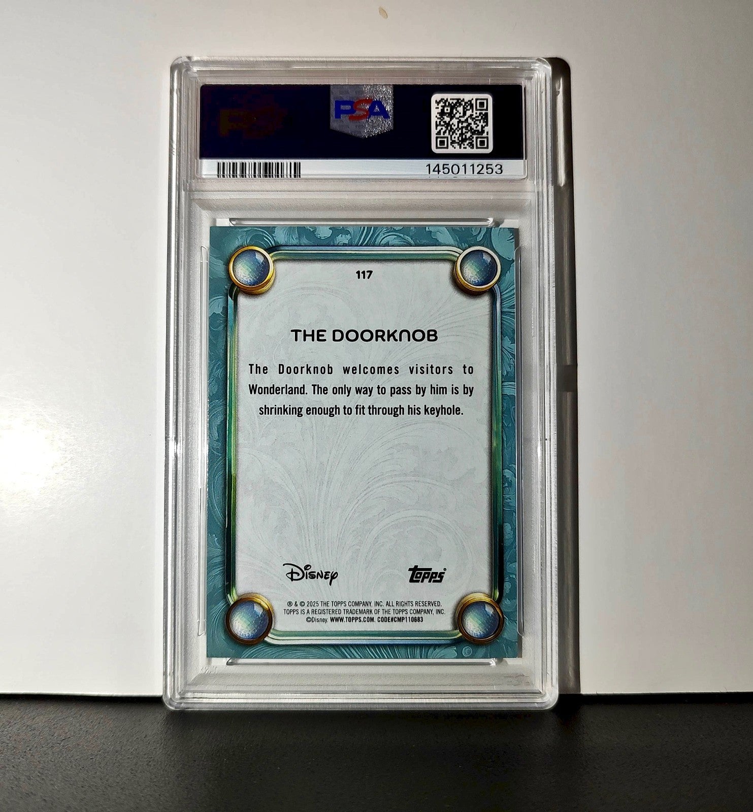 The Doorknob 2025 Topps Disney #117 Diamond Card Alice in Wonderland PSA 9