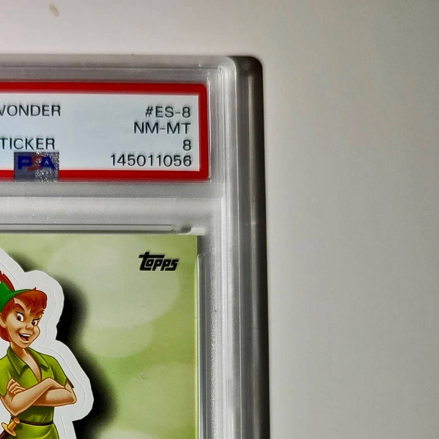 Peter Pan 2025 Topps Disney #ES-8 Enchanted Sticker Card Peter Pan PSA 8