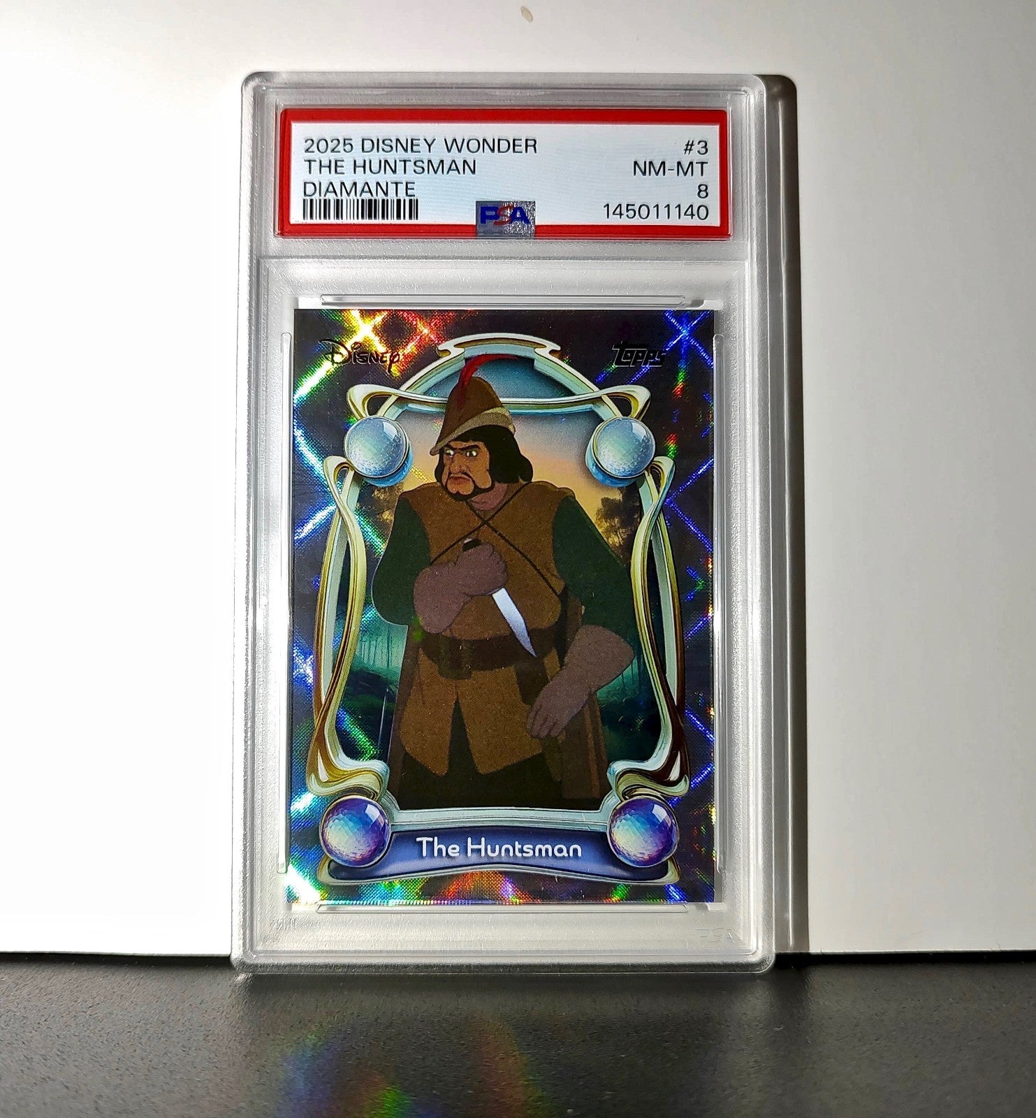 The Huntsman 2025 Topps Disney #3 Winter Snow White and the Seven Dwarfs PSA 8