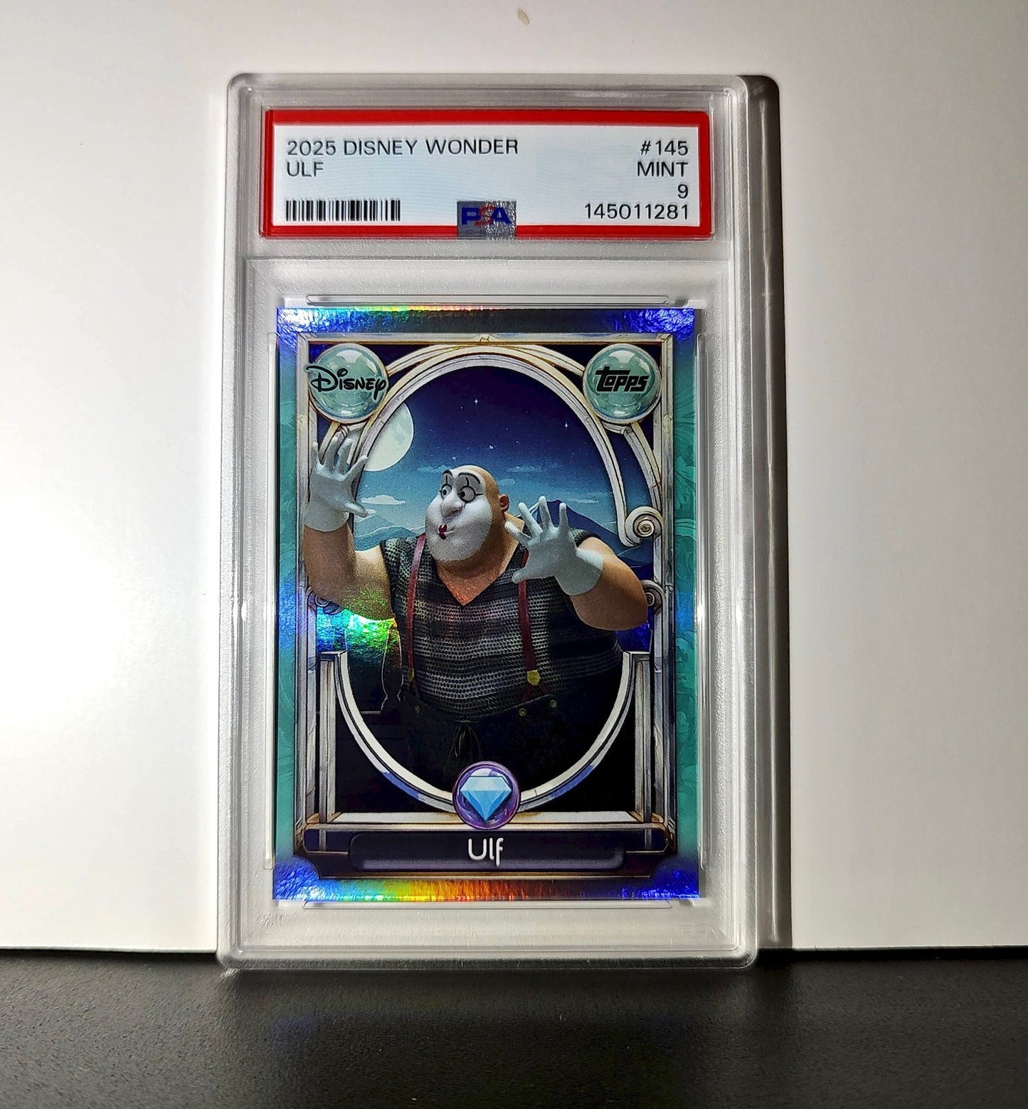 Ulf 2025 Topps Disney Wonder #145 Diamond Card Tangled PSA 9