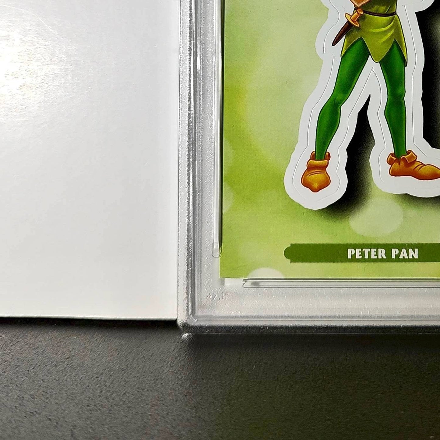 Peter Pan 2025 Topps Disney #ES-8 Enchanted Sticker Card Peter Pan PSA 9