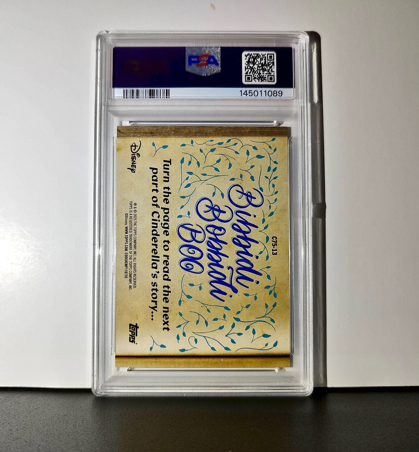 The magic words make a new dress! 2025 Topps Disney #C75-13 PSA 9