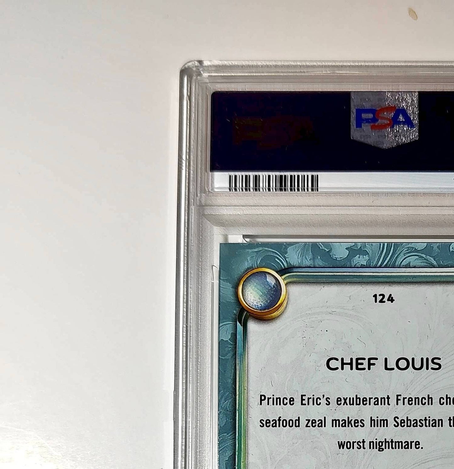 Chef Louis 2025 Topps Disney Wonder #124 Diamond Card The Little Mermaid PSA 7