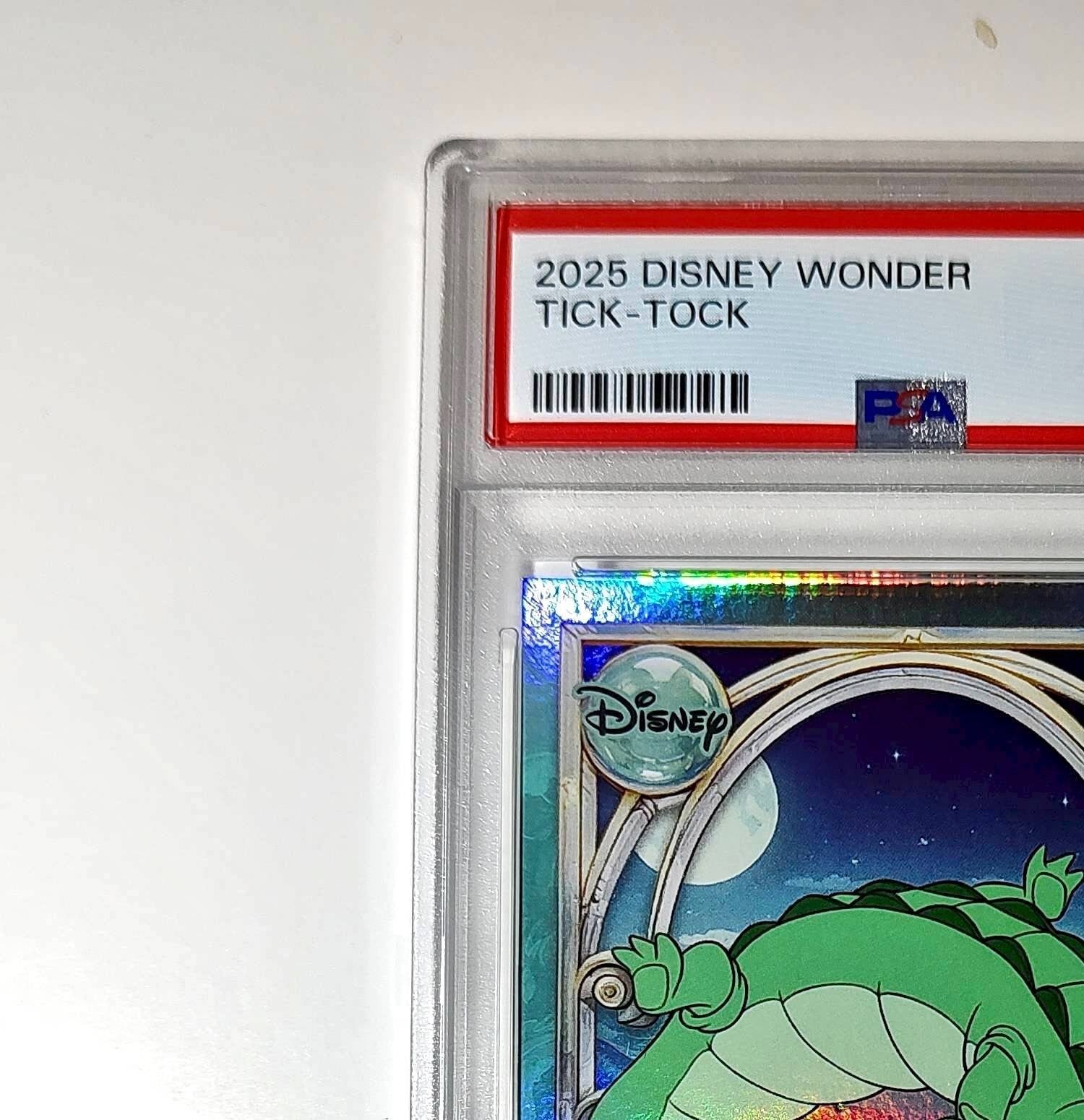 Tick-Tock 2025 Topps Disney Wonder #119 Diamond Card Peter Pan PSA 9