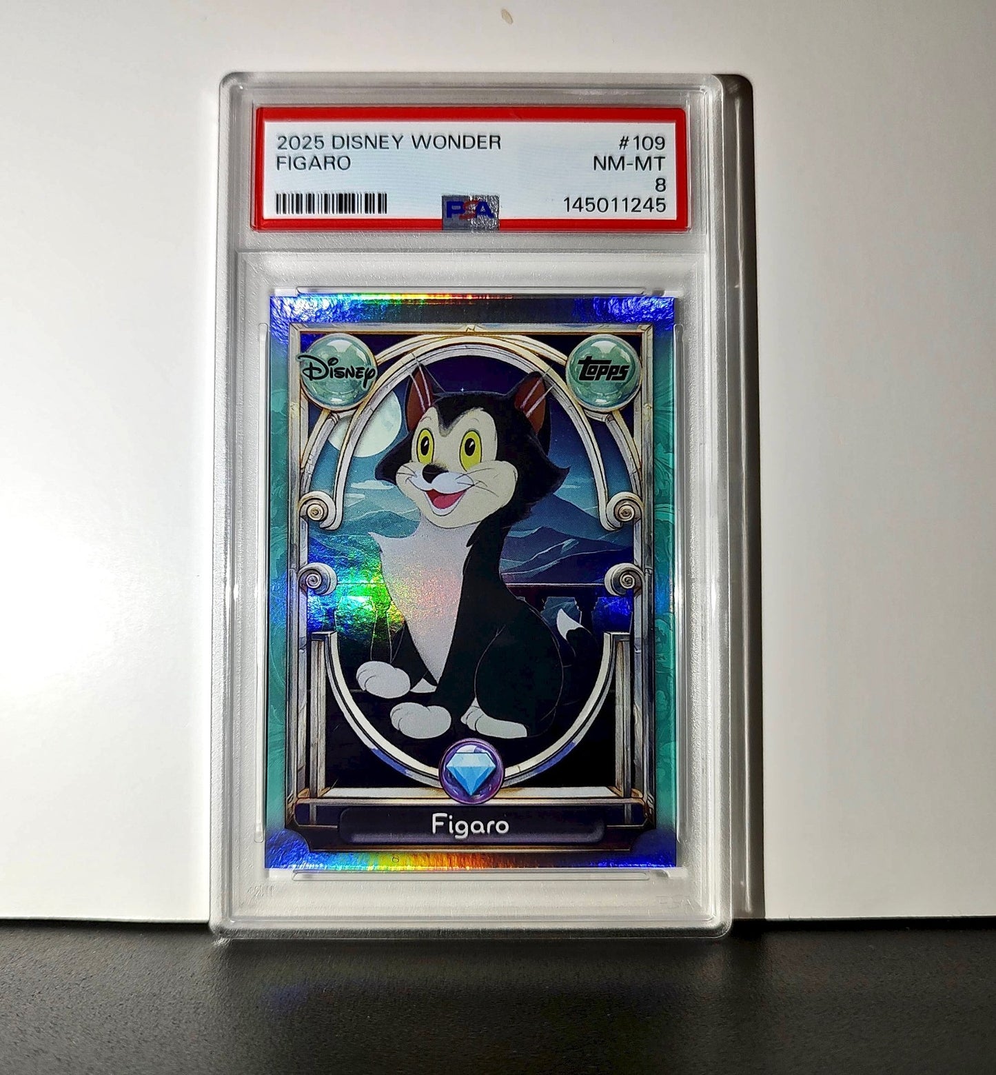 Figaro 2025 Topps Disney Wonder #109 Diamond Card Pinocchio PSA 8