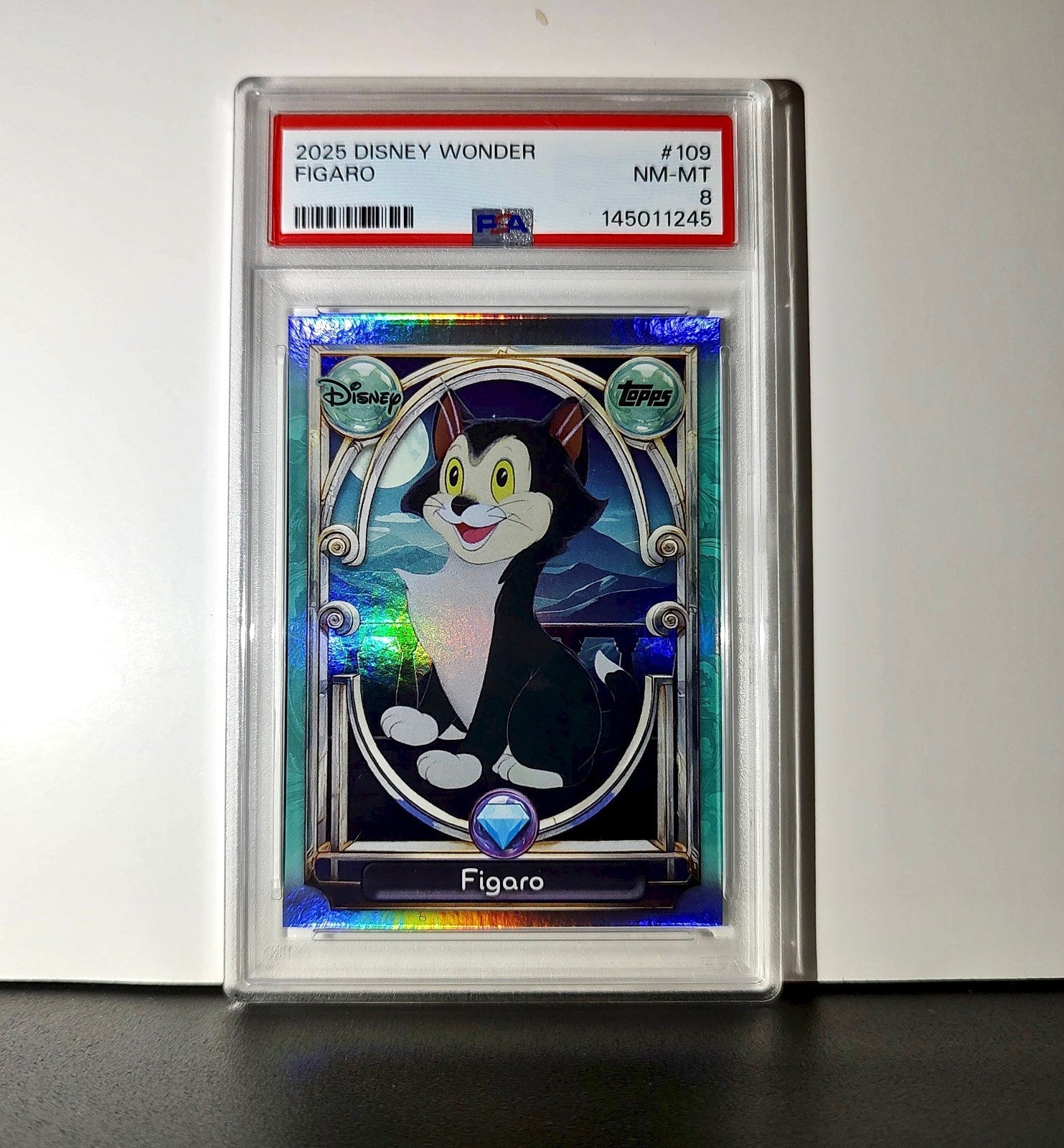 Figaro 2025 Topps Disney Wonder #109 Diamond Card Pinocchio PSA 8