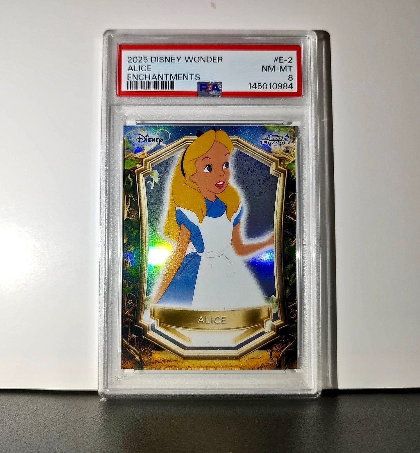Alice 2025 Topps Enchantments Disney Wonder #E-2 Card Alice in Wonderland PSA 8