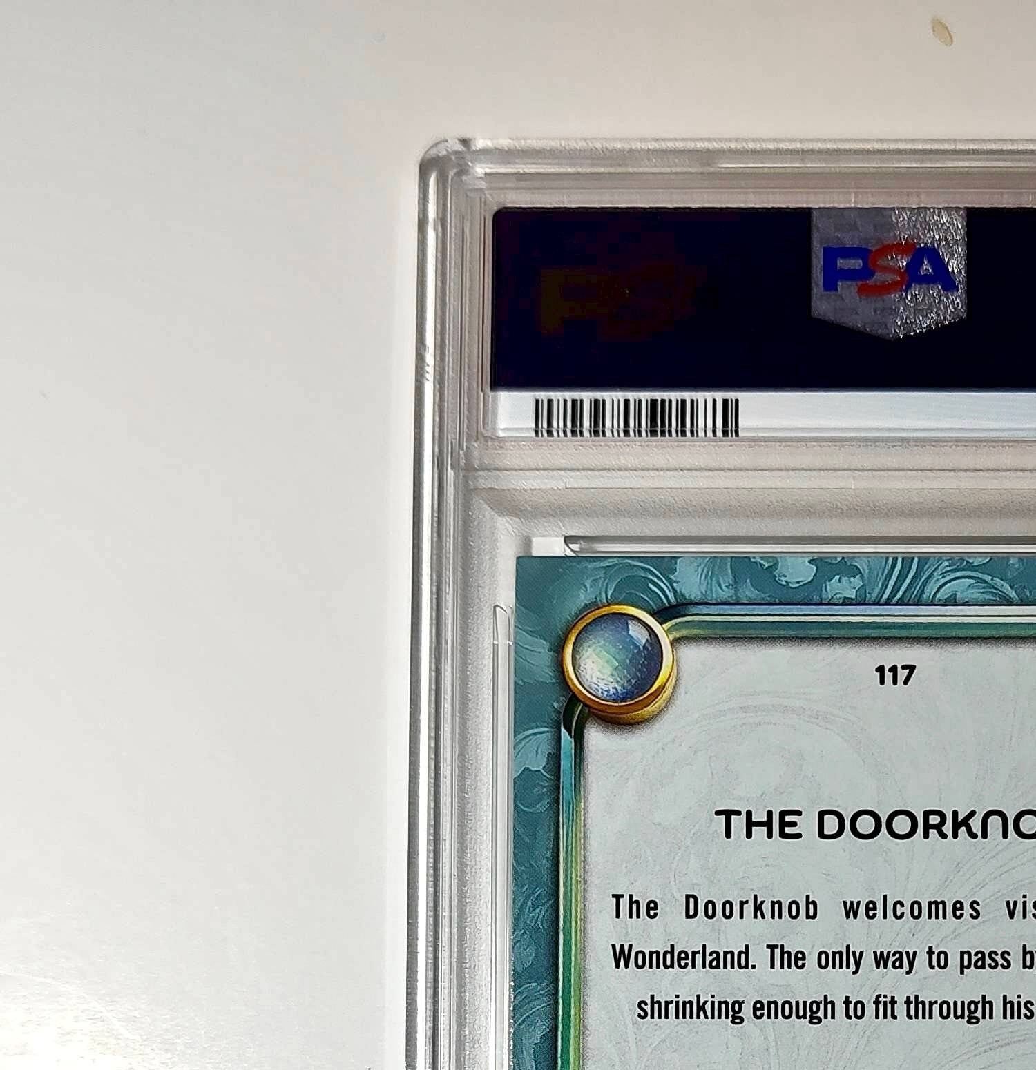 The Doorknob 2025 Topps Disney #117 Diamond Card Alice in Wonderland PSA 9
