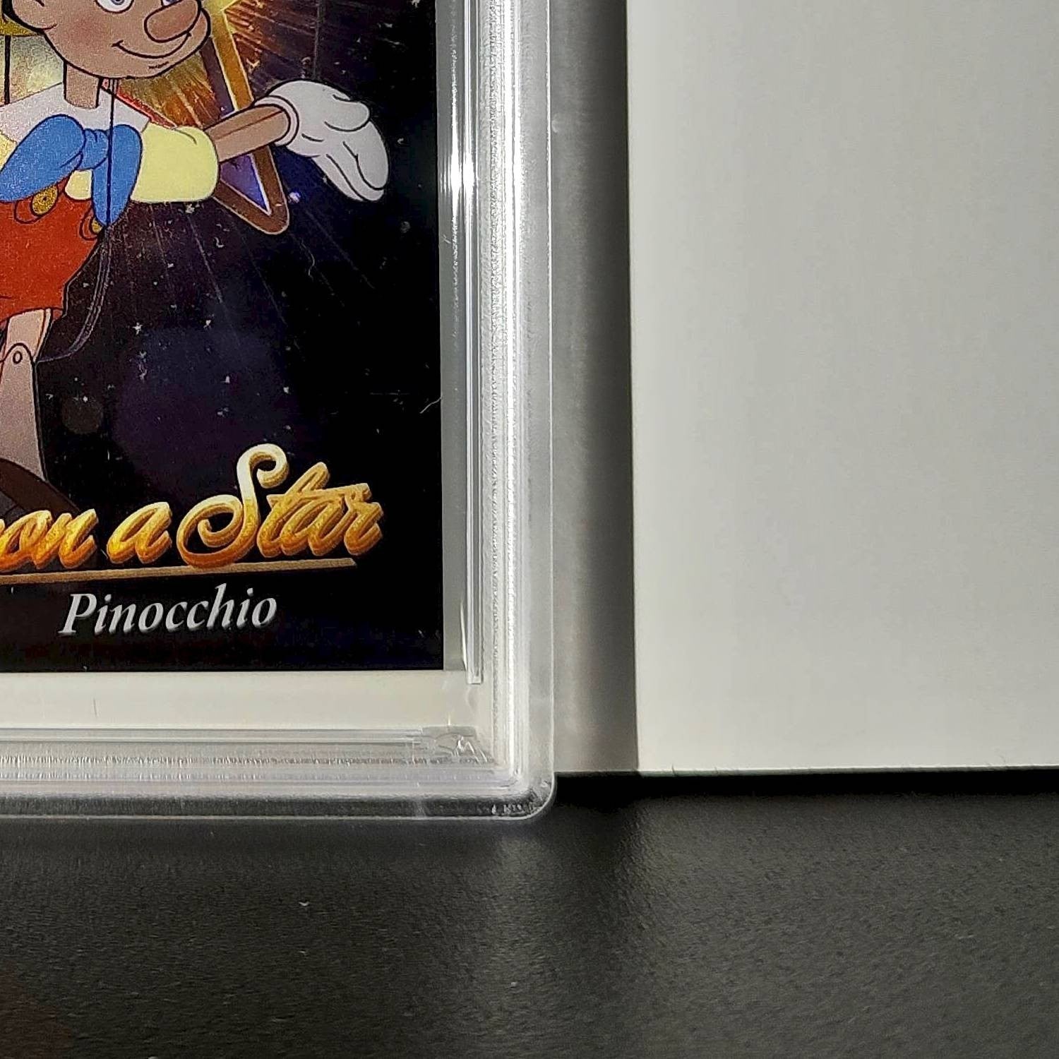 Pinocchio 2025 Topps Chrome Disney #W-1 Wish Upon A Star Die Cut Pinocchio PSA 8