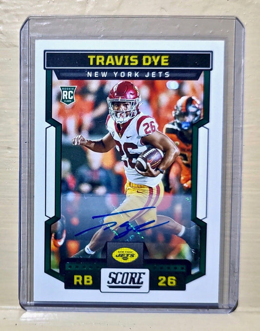 Travis Dye 2023 Panini NFL #329 Score Autograph Rookie Football Card Jets