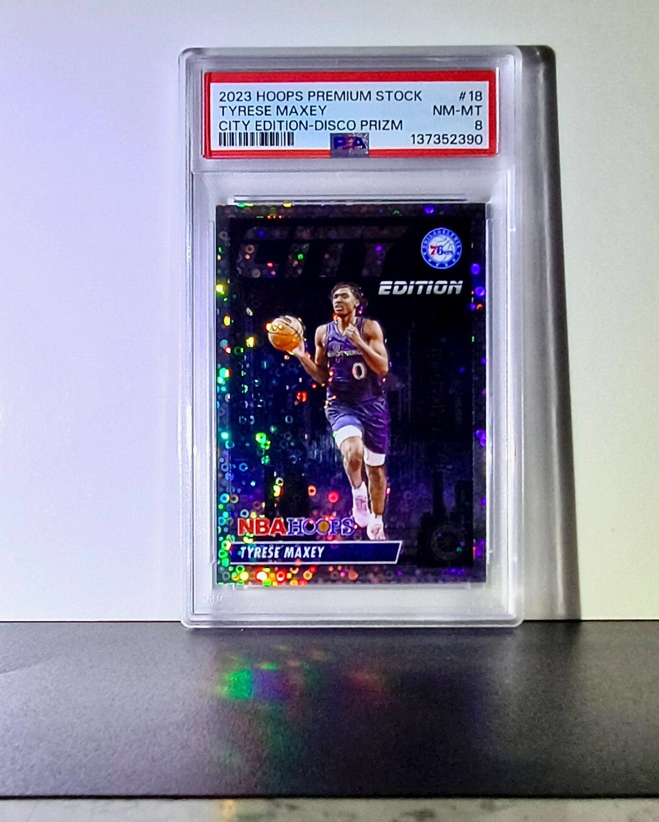 Tyrese Maxey 2023 NBA Panini Hoops Premium #18 City Edition Disco Prizm PSA 8
