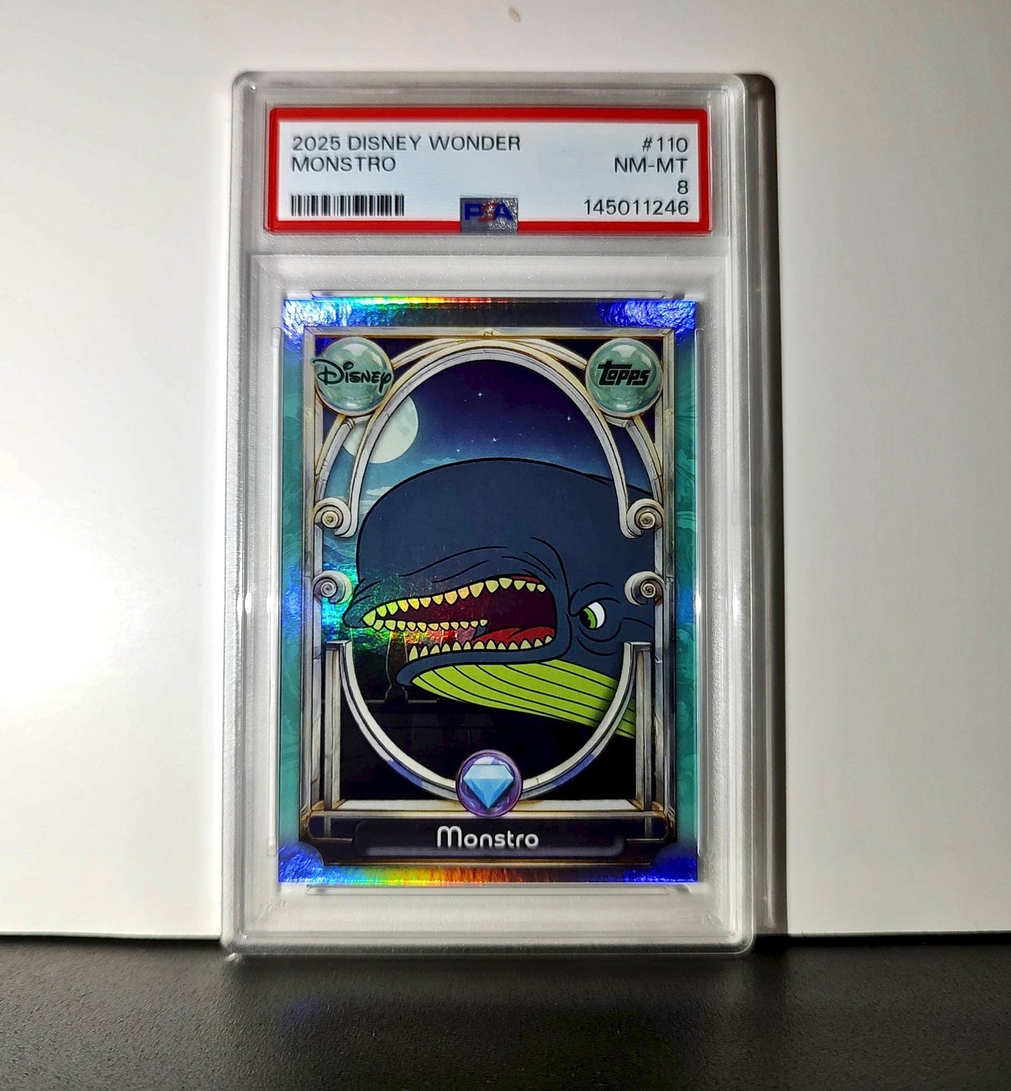 Monstro 2025 Topps Disney Wonder #110 Diamond Card Pinocchio PSA 8