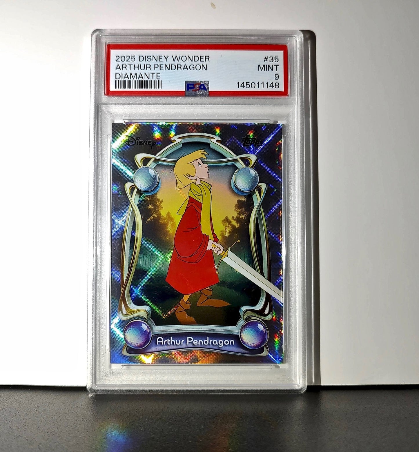 Arthur Pendragon 2025 Topps Disney #35 Winter The Sword in the Stone PSA 9