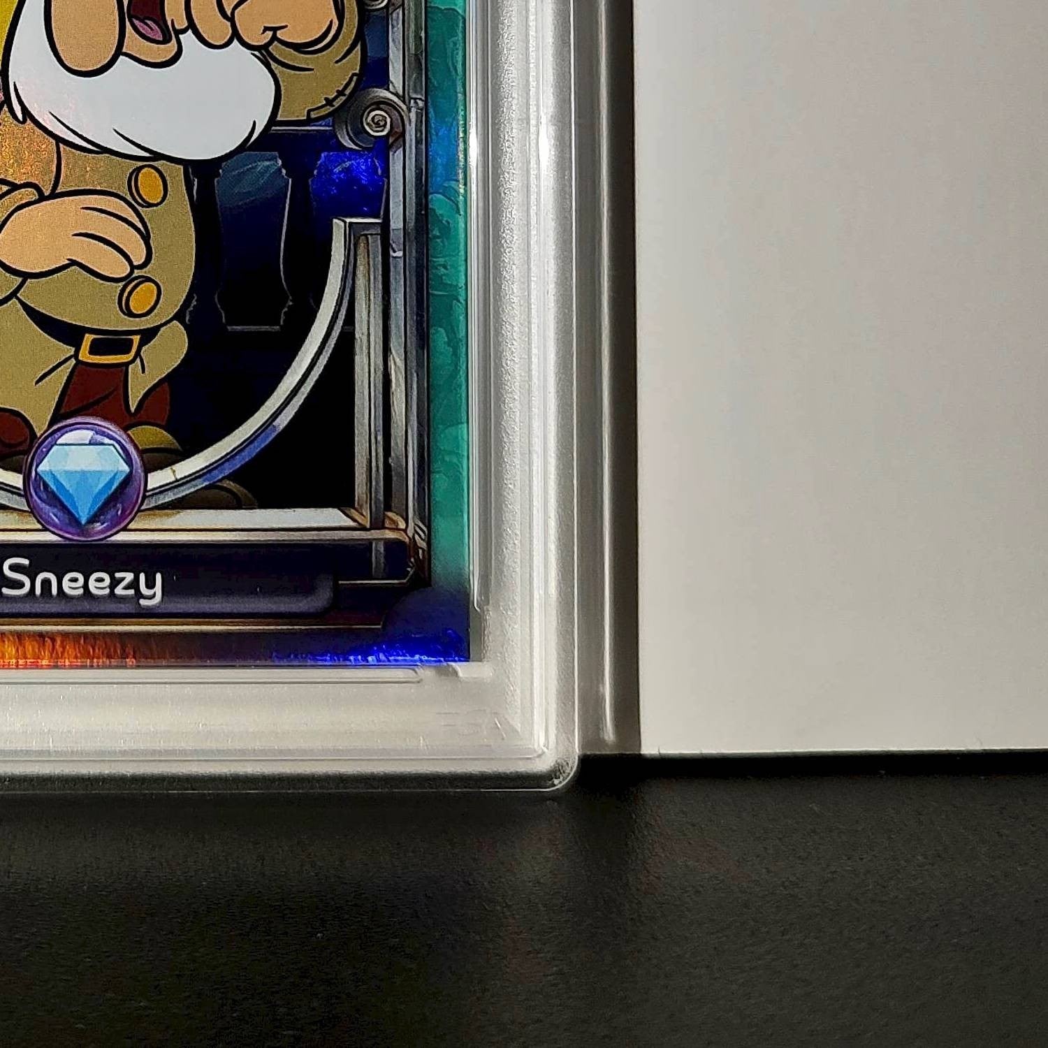 Sneezy 2025 Topps Disney #106 Diamond Card Snow White and the Seven Dwarfs PSA 9