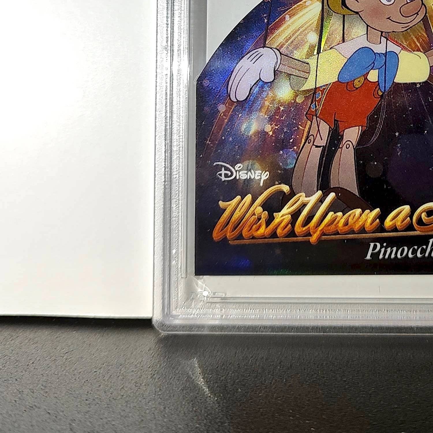 Pinocchio 2025 Topps Chrome Disney #W-1 Wish Upon A Star Die Cut Pinocchio PSA 8