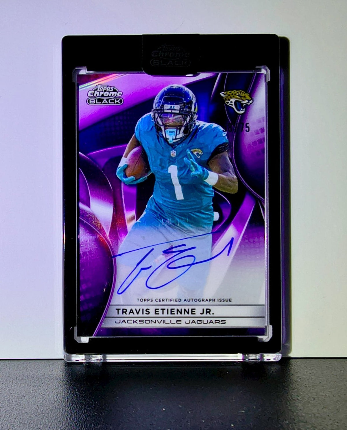 Travis Etienne Jr. 2025 NFL Topps Chrome Black #AU-TE Purple Refractor 58/75