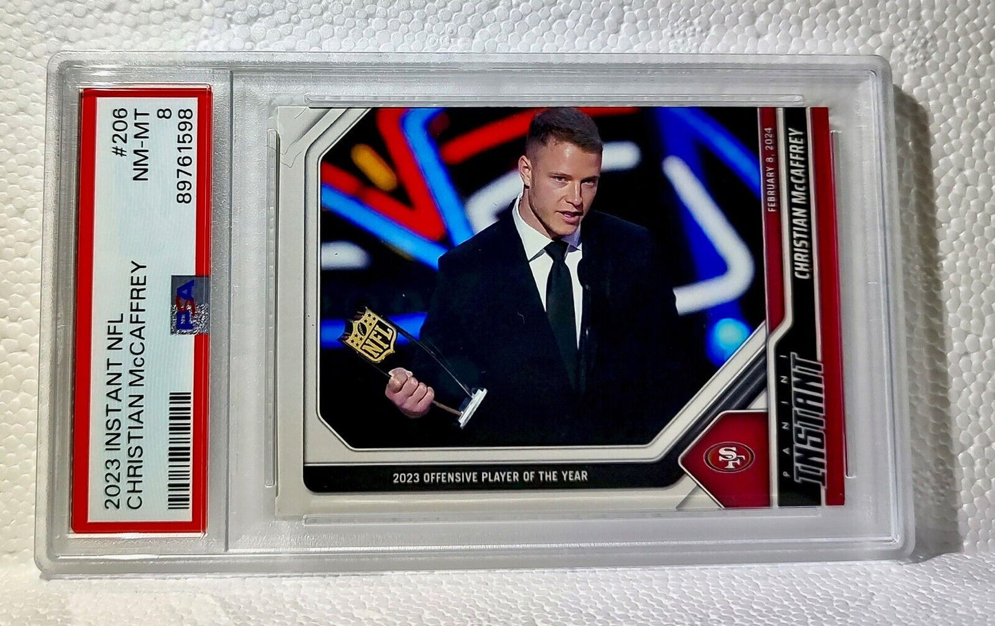 Christian McCaffrey 2023 Panini Offensive Player of the Year #206 Card PSA 8