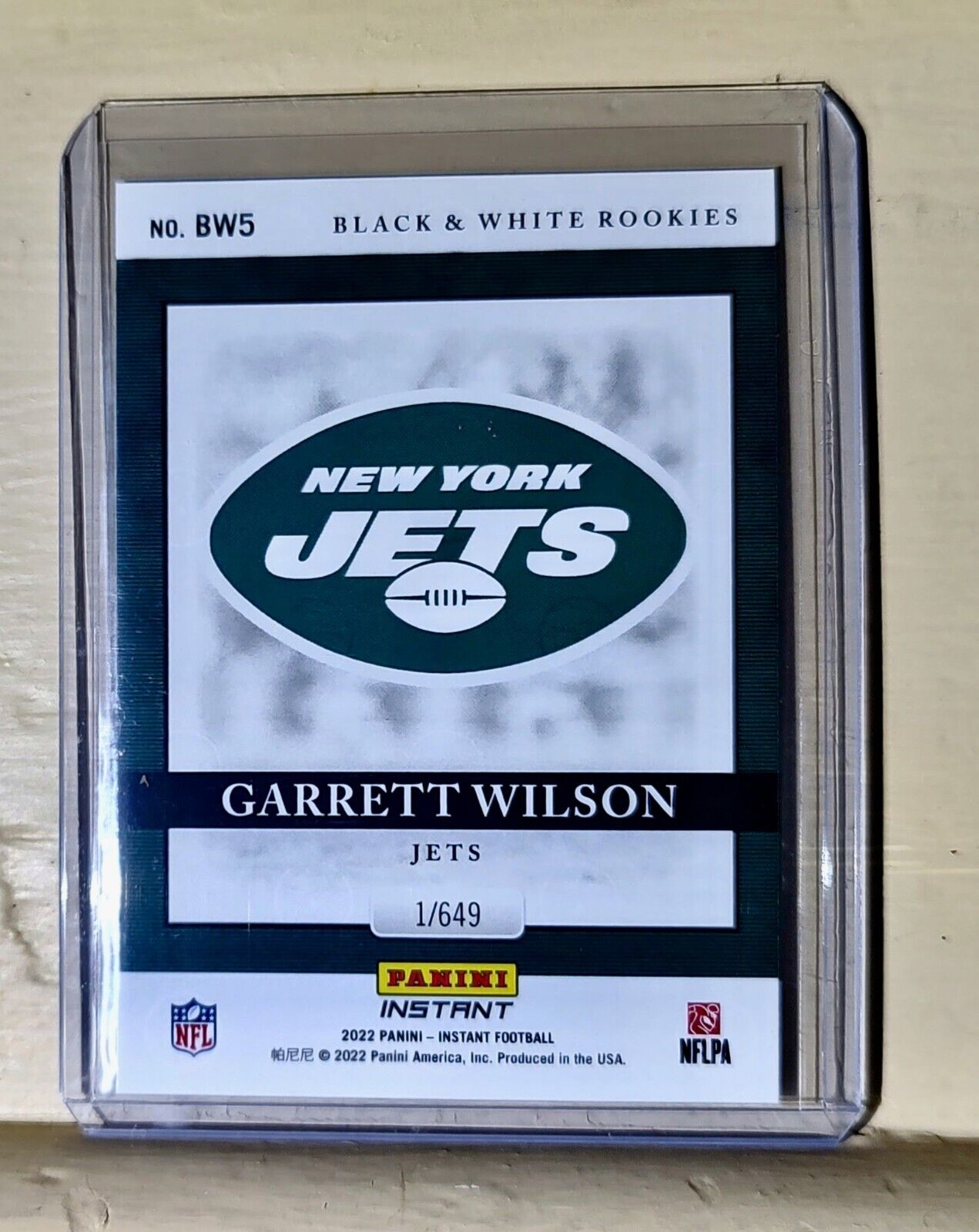 Garrett Wilson 2022 Panini NFL Black & White Rookies #5 Football Card 1 of 649