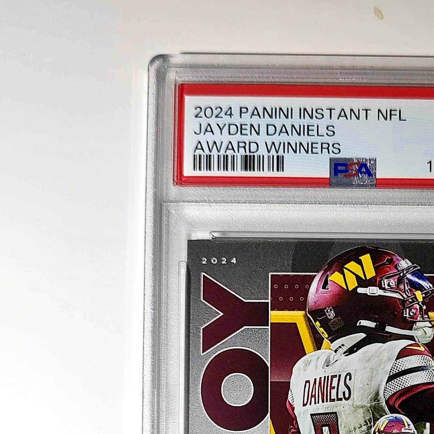 Jayden Daniels 2024 Panini NFL AP Offensive Rookie of the Year Commanders PSA 10