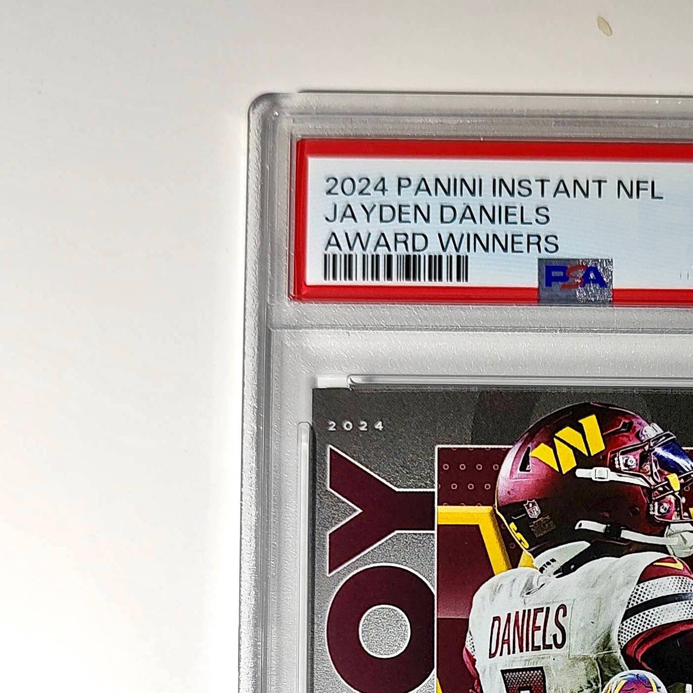 Jayden Daniels 2024 Panini NFL AP Offensive Rookie of the Year Commanders PSA 9