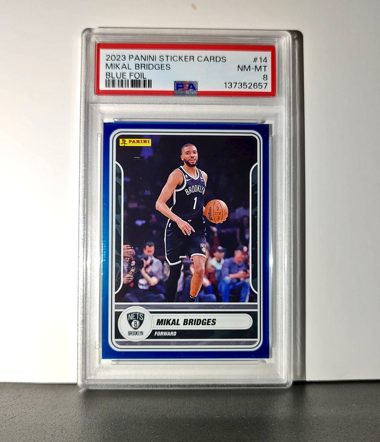 Mikal Bridges 2023-24 Panini Sticker Cards #14 042/200 Blue Foil PSA 8 NM-MT