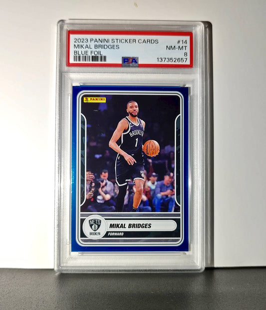 Mikal Bridges 2023-24 Panini Sticker Cards #14 042/200 Blue Foil PSA 8 NM-MT